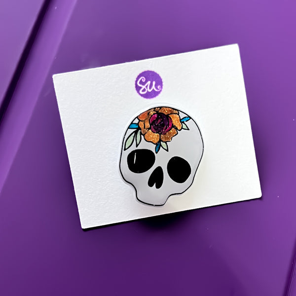 Skull with flower pin